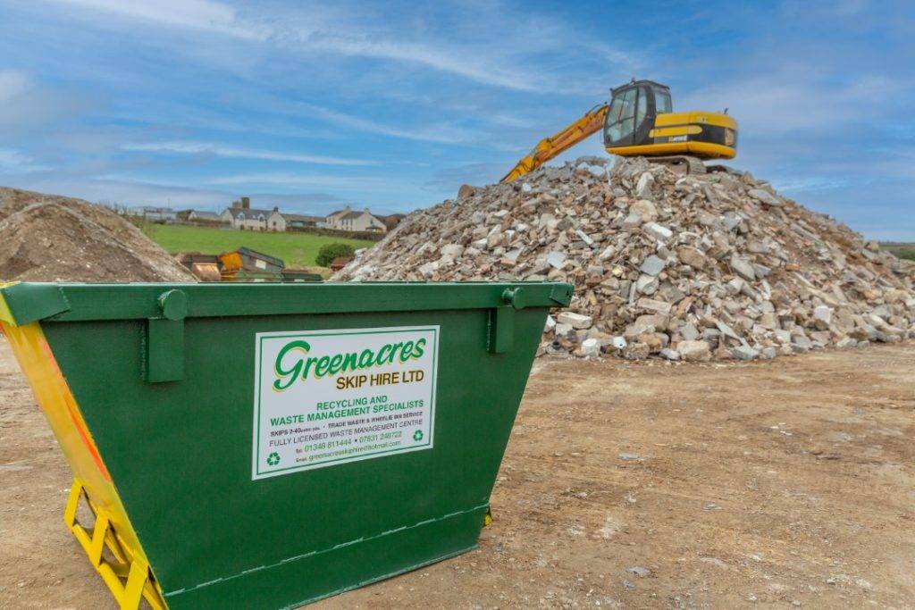 Digger recycling rubble